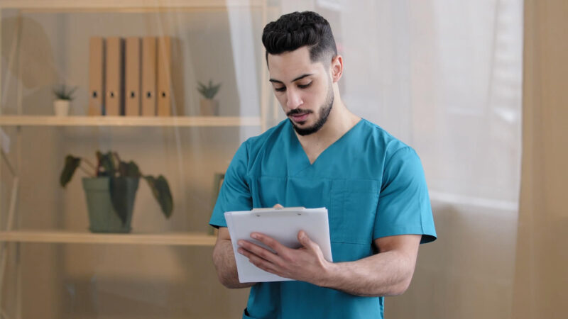 Medical student with his notes