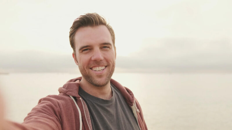 A guy smiling with full confidence